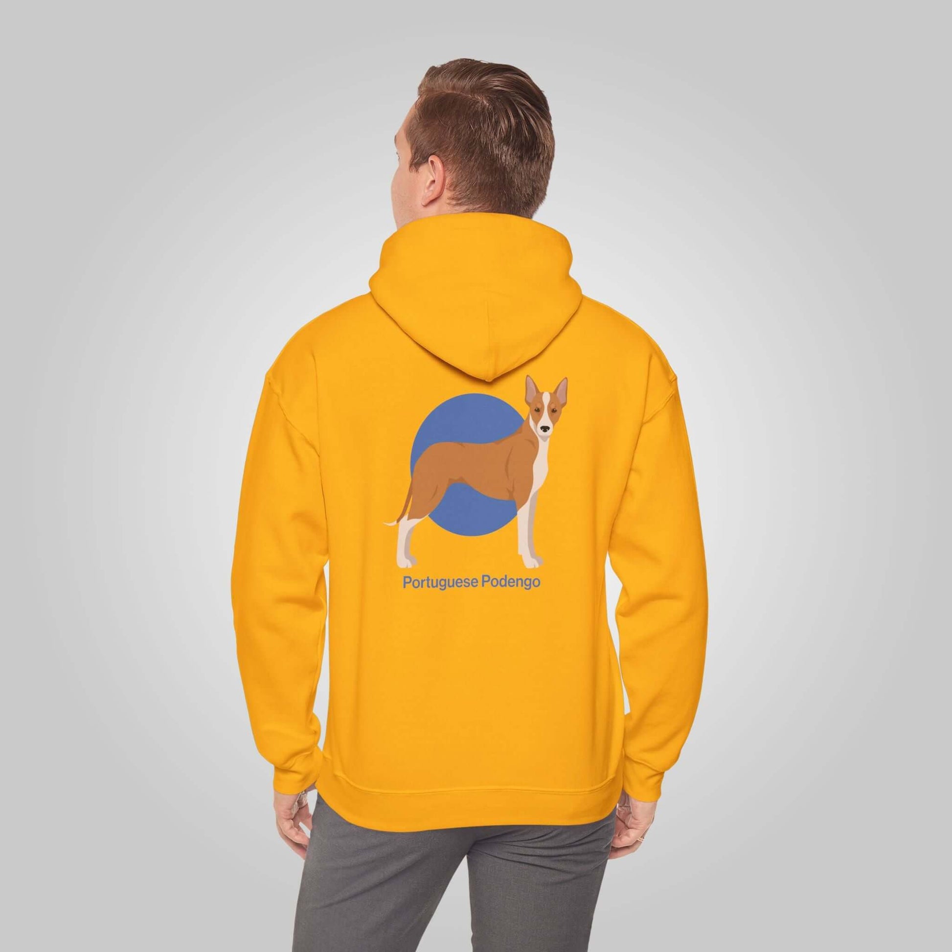 Man wearing a yellow Portuguese Podengo hoodie with a graphic of the dog on the back, labeled "Portuguese Podengo"