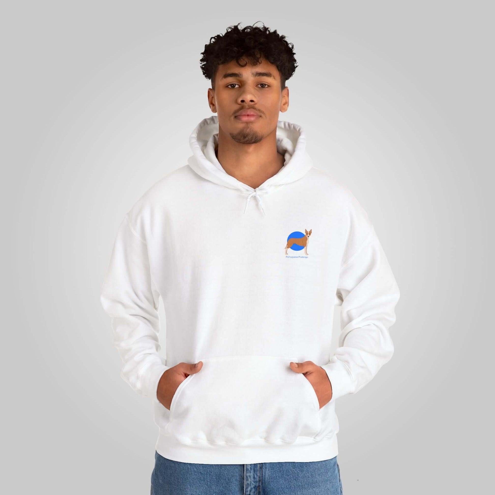 Man wearing a white Portuguese Podengo dog design hooded sweatshirt with hands in pockets, front view.