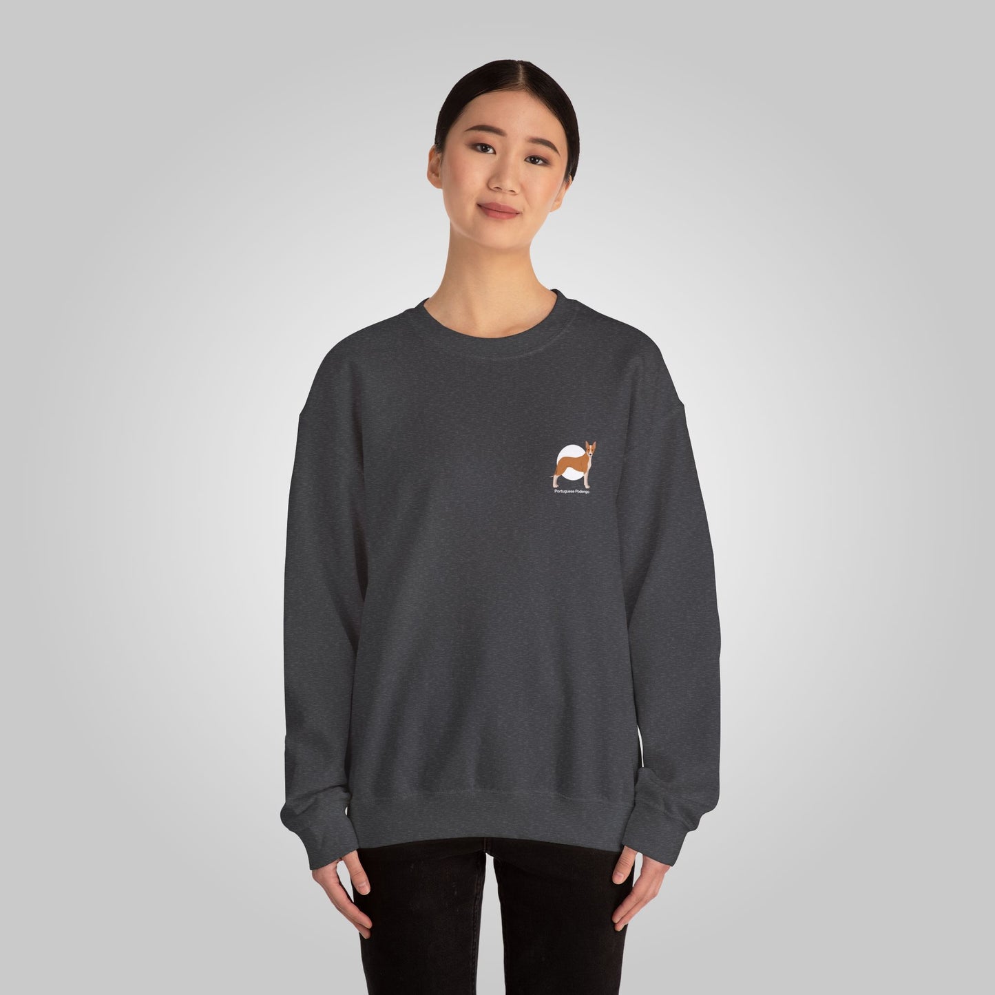 Woman wearing Portuguese Podengo dog crewneck sweatshirt in charcoal gray, small dog graphic on chest